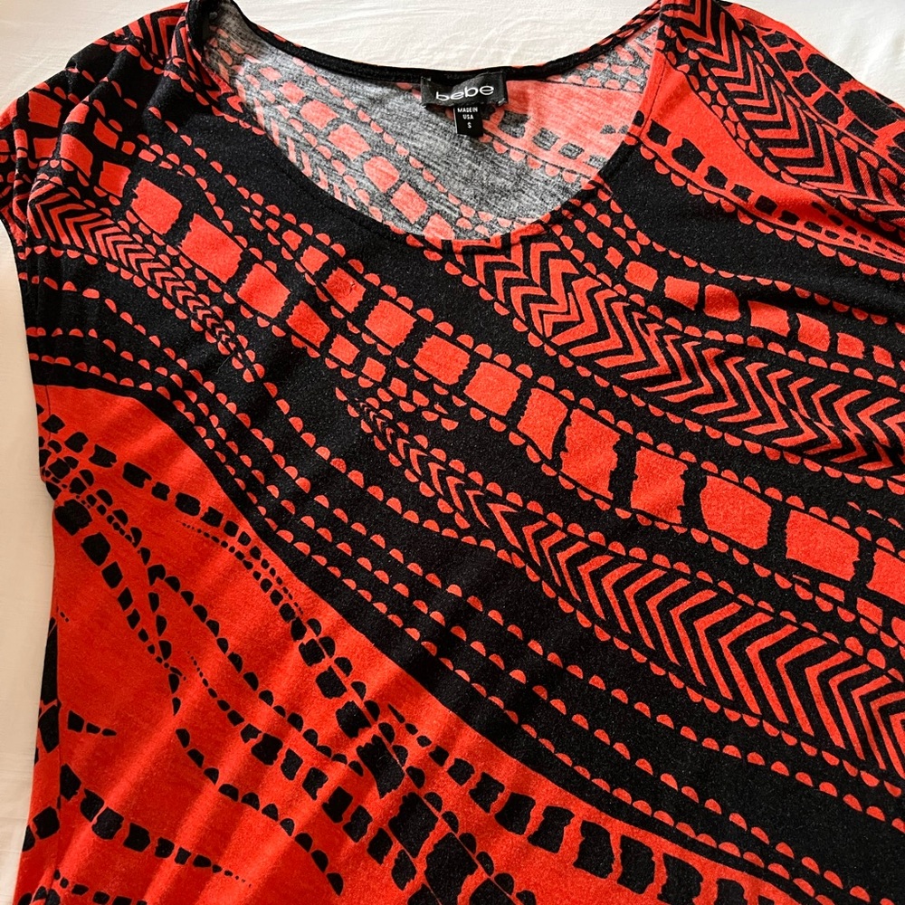 BEBE printed off shoulder top. Size Small.Gorgeous print!
